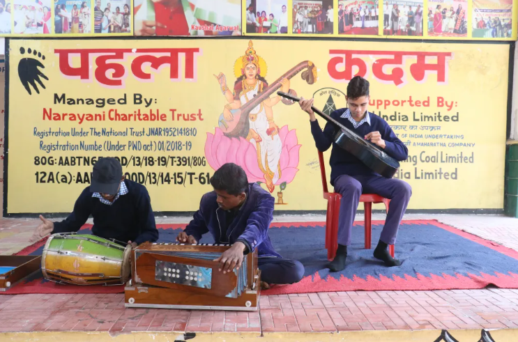Children engaged in learning activities at Pahela Kadam School